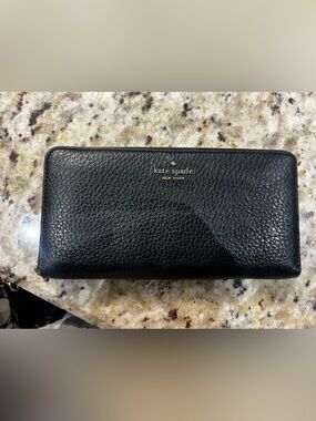 kate spade Black Pebbled Leather Continental Wallet with Gold Logo